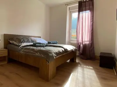 Un ou plusieurs lits dans un hébergement de l'établissement Bel appartement spacieux T4 La Citadelle de 92m2