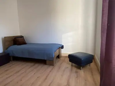 Un ou plusieurs lits dans un hébergement de l'établissement Bel appartement spacieux T4 La Citadelle de 92m2