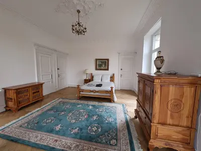 Un ou plusieurs lits dans un hébergement de l'établissement Villa Historique Ideale Groupes et Familles