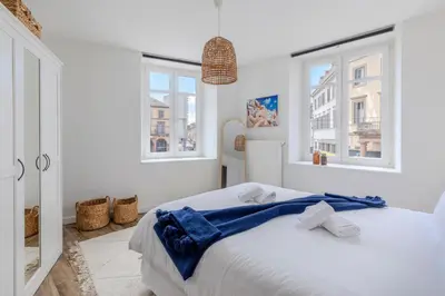 Un ou plusieurs lits dans un hébergement de l'établissement Travel Homes - CityStar - Espace et Confort en plein centre, sur-équipé