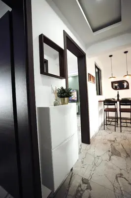 Cuisine ou kitchenette dans l'établissement Royale Lumineux Jacuzzi Parking privé