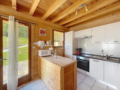 Cuisine ou kitchenette dans l'établissement Chalet du Géhan