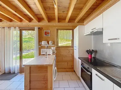 Cuisine ou kitchenette dans l'établissement Chalet du Géhan