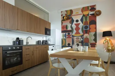 Cuisine ou kitchenette dans l'établissement Au Cheval Blanc - Appartement Familial 6P Parking privé proche Colmar Centre