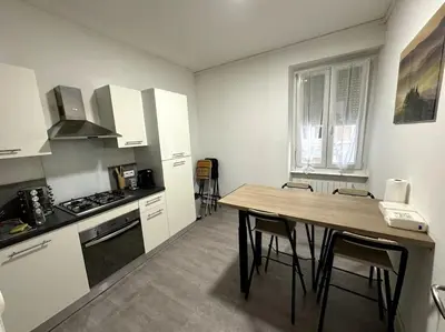 Cuisine ou kitchenette dans l'établissement Appartement