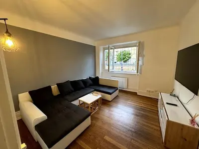 Télévision ou salle de divertissement dans l'établissement Appartement