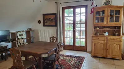 Télévision ou salle de divertissement dans l'établissement Le Refuge de Kintzheim