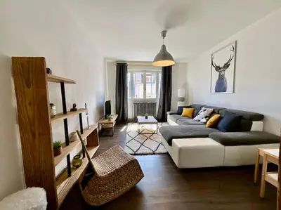 Coin salon dans l'établissement Epicea, bel appartement avec balcon au centre ville