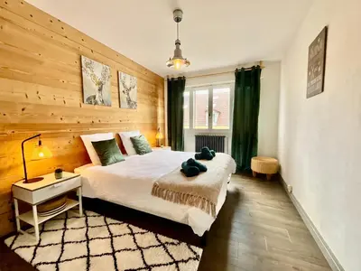 Un ou plusieurs lits dans un hébergement de l'établissement Epicea, bel appartement avec balcon au centre ville
