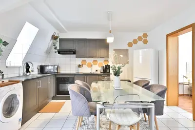 Cuisine ou kitchenette dans l'établissement Le CLOONEY - appartement en duplex - Hyper centre