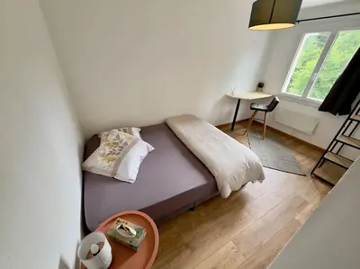 Un ou plusieurs lits dans un hébergement de l'établissement L Envol Maison Entière