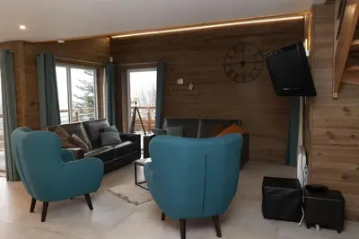 Télévision ou salle de divertissement dans l'établissement Balcon des Gouttridos, imprenable vue lac 6p