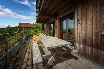 Balcon ou terrasse dans l'établissement Chalet La Souris, chaleureux avec vue panoramique
