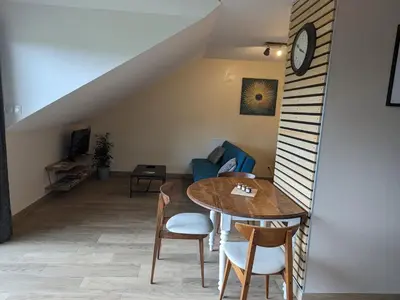 Coin salon dans l'établissement Cosy gîte dans les Vosges, terrasse privative, idéal randonnées - FR-1-589-643