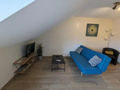 Télévision ou salle de divertissement dans l'établissement Cosy gîte dans les Vosges, terrasse privative, idéal randonnées - FR-1-589-643