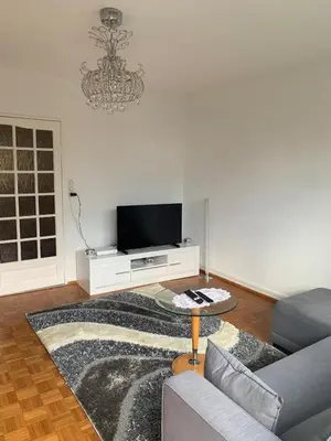 Télévision ou salle de divertissement dans l'établissement Appartement en face de la gare de St-Louis
