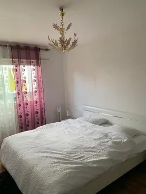 Un ou plusieurs lits dans un hébergement de l'établissement Appartement en face de la gare de St-Louis