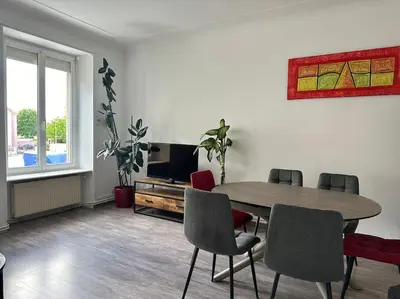 Coin salon dans l'établissement #Aujé - Appart Mulhouse Centre