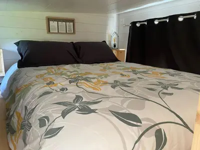 Un ou plusieurs lits dans un hébergement de l'établissement Tiny House à Champdray La Ty Vosg'Breizh