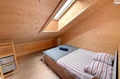 Un ou plusieurs lits dans un hébergement de l'établissement Chalet Caroubier - Chalet avec vue montagne