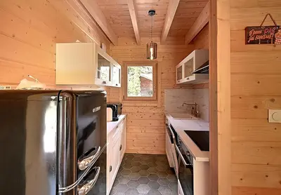 Cuisine ou kitchenette dans l'établissement Chalet Caroubier - Chalet avec vue montagne