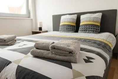 Un ou plusieurs lits dans un hébergement de l'établissement Appartement proche du Coeur de Colmar et de la gare