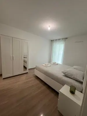 Un ou plusieurs lits dans un hébergement de l'établissement Appartement AN-Lux