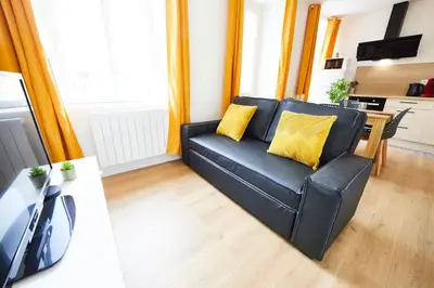 Coin salon dans l'établissement RB-1D Appartement F2 au 1er étage à Mulhouse de 1 à 2 pers