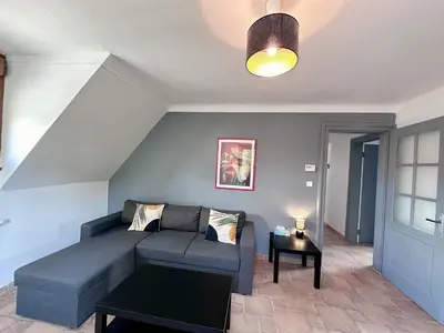 Coin salon dans l'établissement Gîte de Juliana 6 personnes Baldenheim