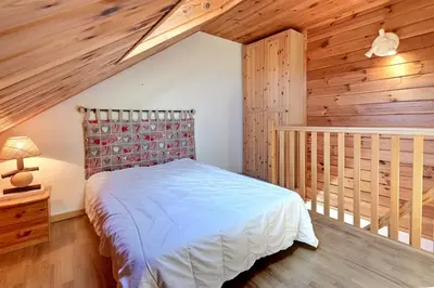 Un ou plusieurs lits dans un hébergement de l'établissement Le Nid des Vosges - Appt vue montagne