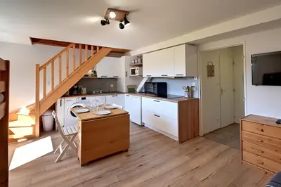 Cuisine ou kitchenette dans l'établissement Le Nid des Vosges - Appt vue montagne