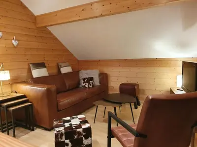 Coin salon dans l'établissement Le Murmure du Ruisseau