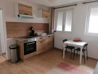 Cuisine ou kitchenette dans l'établissement Le Charmontais