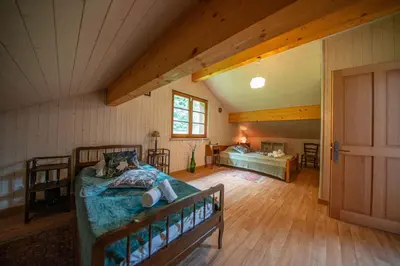 Un ou plusieurs lits dans un hébergement de l'établissement La ferme aux belles sources