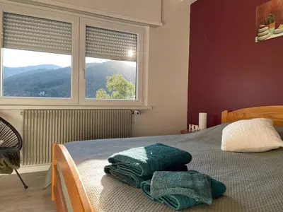 Un ou plusieurs lits dans un hébergement de l'établissement Au reposoir - vue sur la montagne