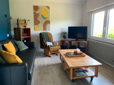 Télévision ou salle de divertissement dans l'établissement Au reposoir - vue sur la montagne