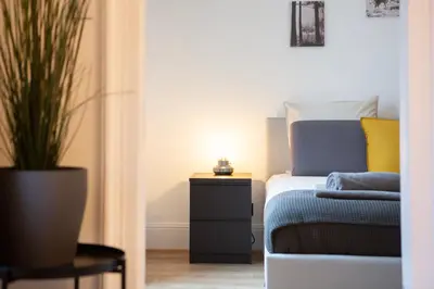 Un ou plusieurs lits dans un hébergement de l'établissement Moderne et spacieux, près du centre de Mulhouse