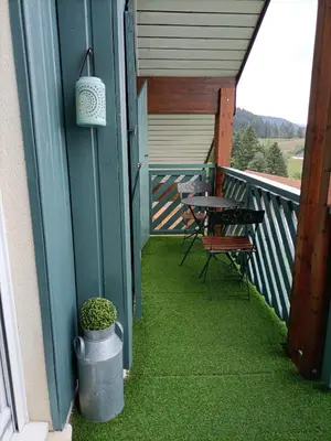 Balcon ou terrasse dans l'établissement Appartement GERARDMER - Magnifique vue sur le lac - 2 adultes et 2 enfants maximum