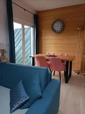 Coin salon dans l'établissement Appartement GERARDMER - Magnifique vue sur le lac - 2 adultes et 2 enfants maximum