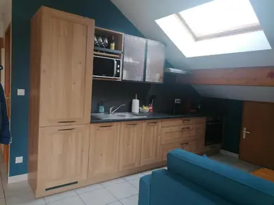 Cuisine ou kitchenette dans l'établissement Appartement GERARDMER - Magnifique vue sur le lac - 2 adultes et 2 enfants maximum