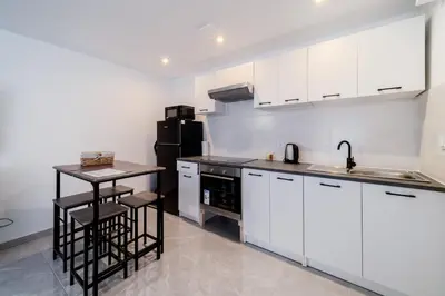 Cuisine ou kitchenette dans l'établissement Batié - Appt 4 personnes à Mulhouse