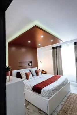 Un ou plusieurs lits dans un hébergement de l'établissement Prestige Lumineux Jacuzzi Parking privé