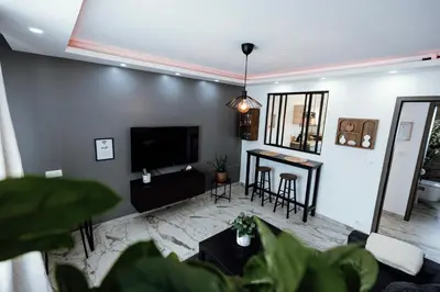 Télévision ou salle de divertissement dans l'établissement Prestige Lumineux Jacuzzi Parking privé