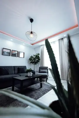 Coin salon dans l'établissement Prestige Lumineux Jacuzzi Parking privé