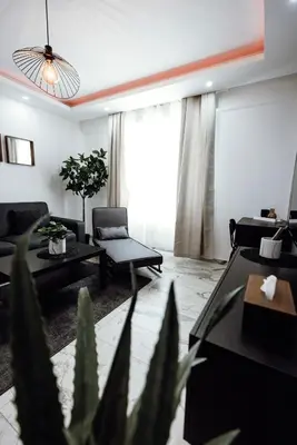 Coin salon dans l'établissement Prestige Lumineux Jacuzzi Parking privé