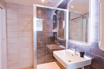Salle de bains dans l'établissement Appartements Les Vosges