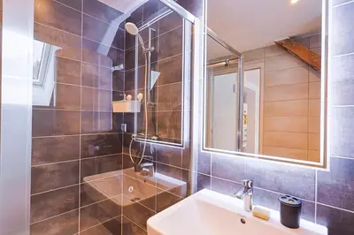 Salle de bains dans l'établissement Appartements Les Vosges