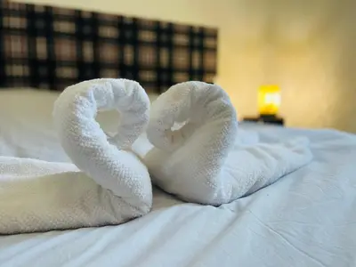 Un ou plusieurs lits dans un hébergement de l'établissement Gîte du Tonnelier