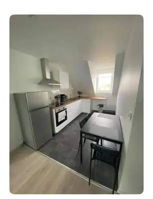 Cuisine ou kitchenette dans l'établissement Appartement 2 pièces cosy proche centre ville