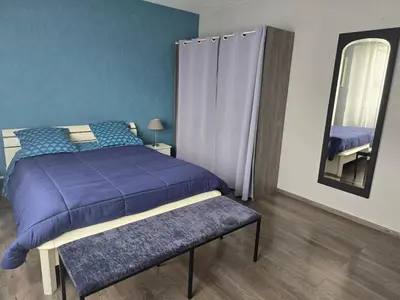 Un ou plusieurs lits dans un hébergement de l'établissement Bel appartement 3 pièces dans une résidence calme
